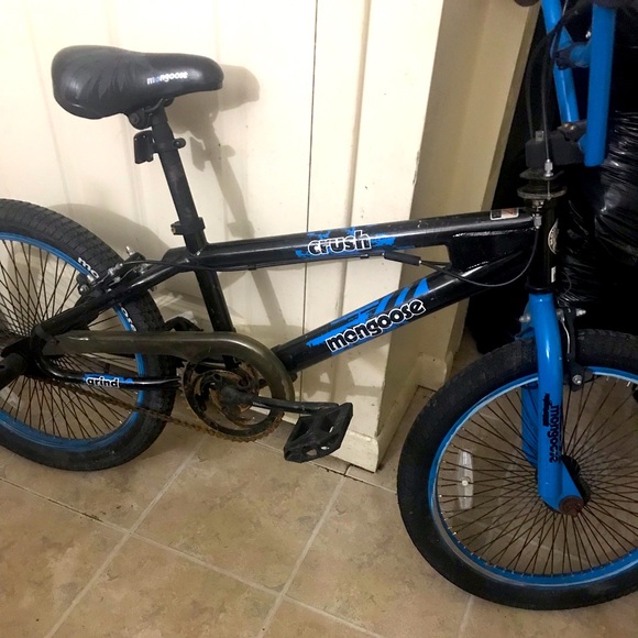black and blue mongoose bike